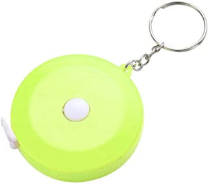 GREEN PLASTIC / NICKEL PLATED MEASUREMENT TAPE KEYHOLDER WITH WHITE LEDIN BLACK FOLDED BOX